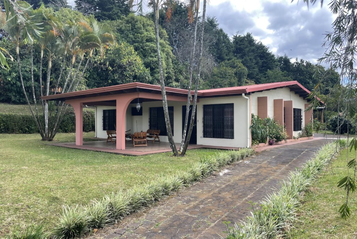 Single Level Turnkey 3 BR Grecia View Home on Flat Half Acre