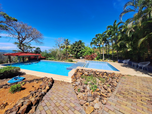 Spectacular Atenas Ocean View 9 Acre Property with 4 Homes