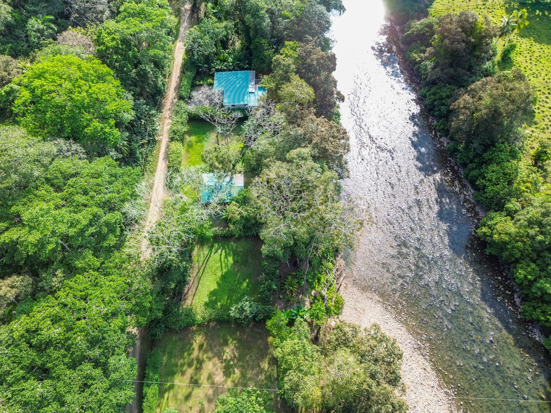 Rare Riverfront Lot Steps from Dominical