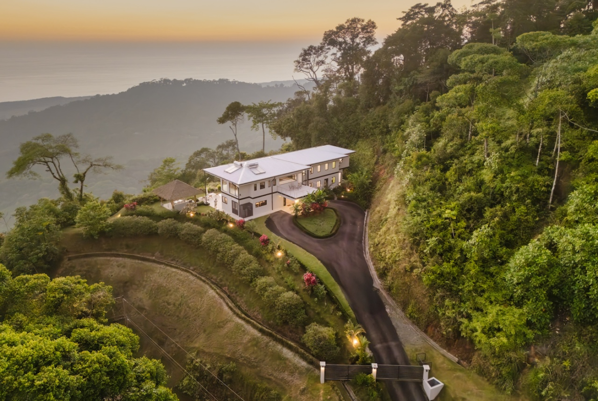 Discover the luxurious Estate Above Dominical, featuring 5 bedrooms, ocean views, and seamless indoor-outdoor living